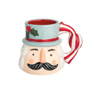 Blue Nutcracker Handle Mug
Hand-painted ceramic
Figural Christmas candy handle
13 oz. Dolomite