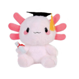 A plush toy of a pink axolotl wearing a black graduation cap with a yellow tassel and holding a rolled diploma with a red ribbon, set against a plain white background.