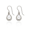 Spirit by Silver Forest White Bead in Open Oval Earrings in Silver