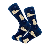 A pair of navy blue crew socks featuring a repeating pattern of light cream-colored puppies and small blue paw prints, displayed against a solid white background.