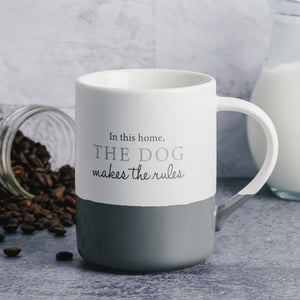 In This Home the Dog Makes The Rules 18 oz. Mug